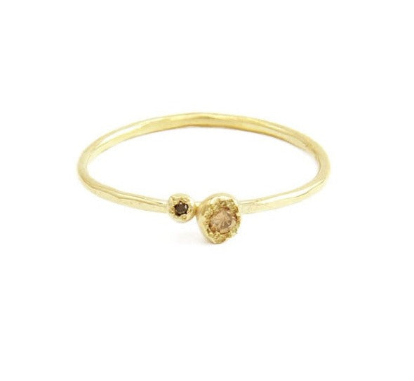 two tiny nuggets ring with black and champagne diamonds