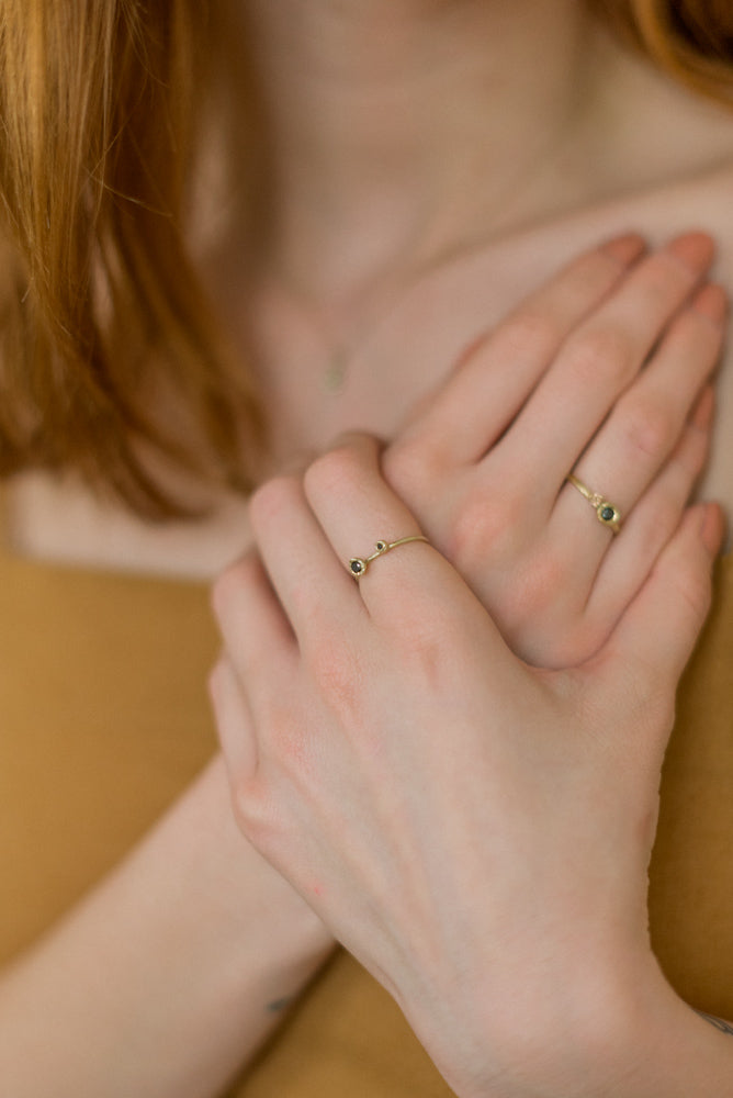 two gold nuggets ring with black diamonds