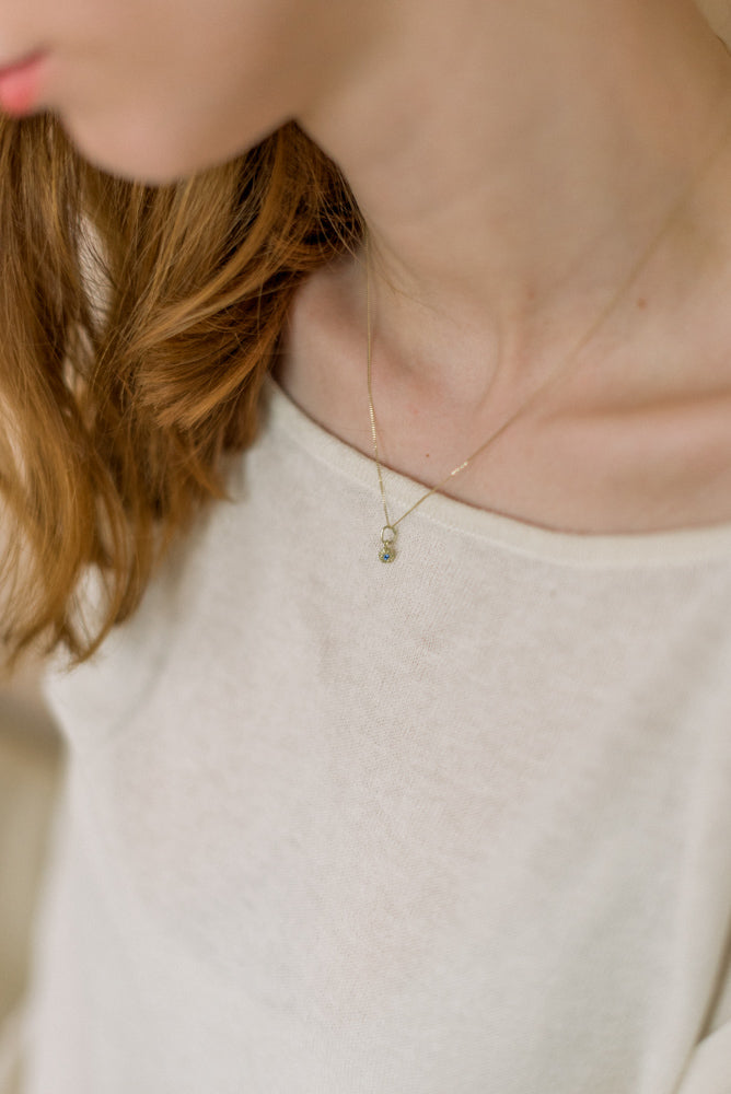 Flowermoon gold nugget necklace with black diamond