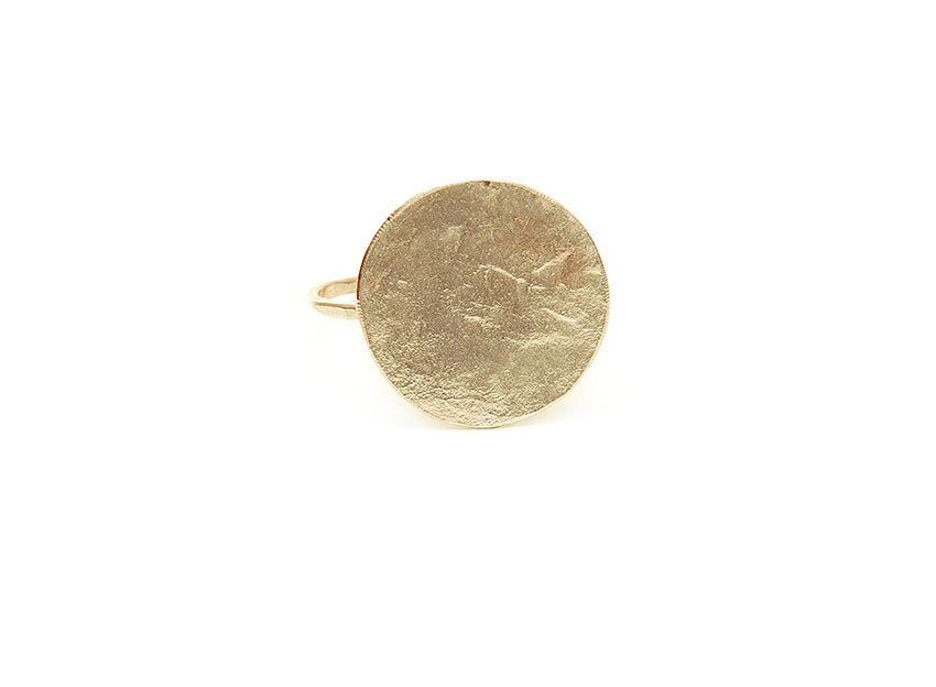 Hand forged gold disc ring