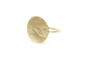 Hand forged gold disc ring